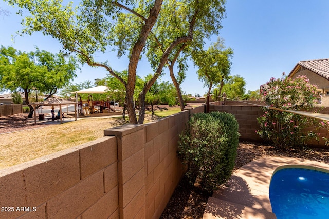5401 S Dove Holw, Buckeye, AZ 85326 - fenced backyard featuring a gazebo
