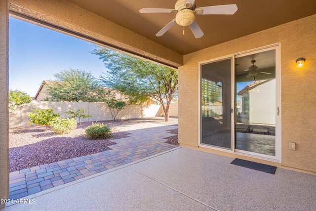 view of patio / terrace featuring ceiling fan