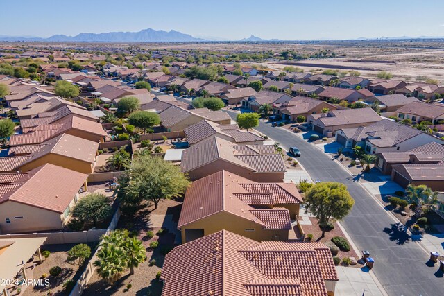 birds eye view of property with a mountain view