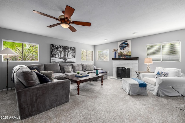 15027 N 61st Pl, Scottsdale, AZ 85254 - living room with a ceiling fan, a brick fireplace, carpet, and a wealth of natural light