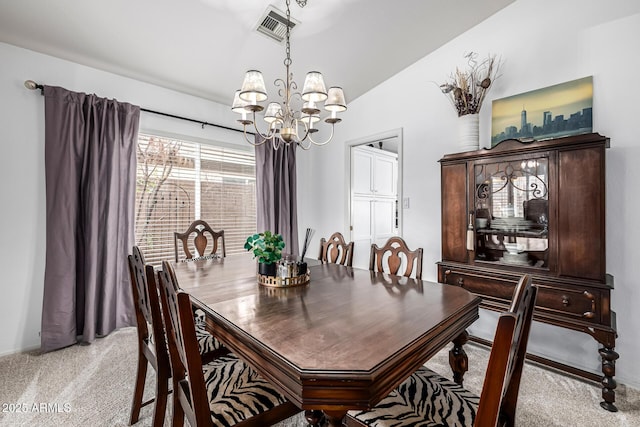 15027 N 61st Pl, Scottsdale, AZ 85254 - dining area featuring visible vents, light colored carpet, and an inviting chandelier