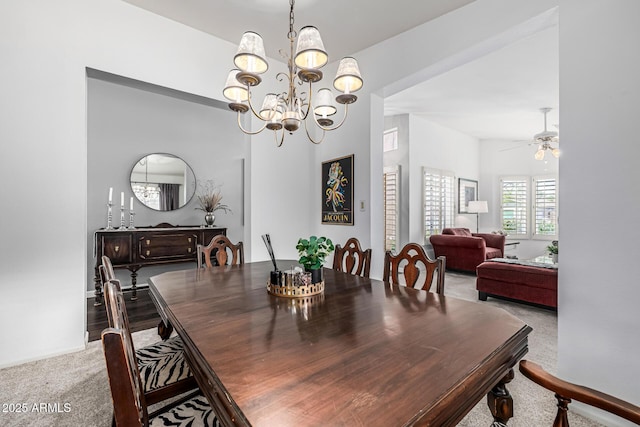 15027 N 61st Pl, Scottsdale, AZ 85254 - dining room with carpet and ceiling fan with notable chandelier