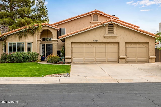 15027 N 61st Pl, Scottsdale, AZ 85254 - mediterranean / spanish-style home featuring a front yard, driveway, an attached garage, stucco siding, and a tiled roof