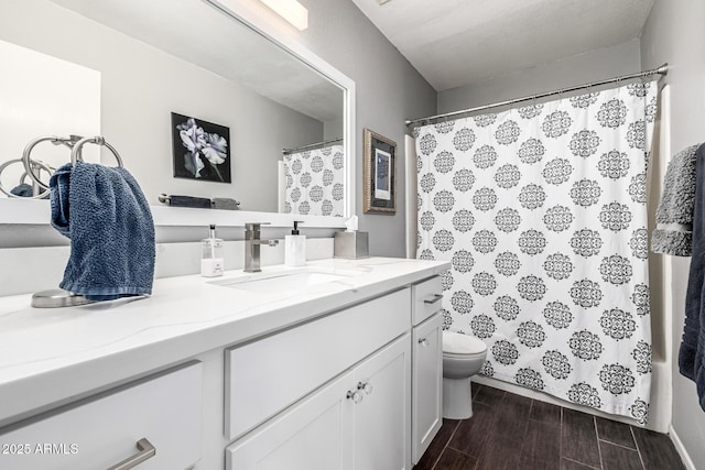 15027 N 61st Pl, Scottsdale, AZ 85254 - full bath with wood finish floors, toilet, a shower with shower curtain, and vanity