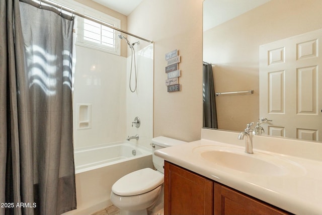 full bathroom featuring shower / tub combo with curtain, vanity, and toilet