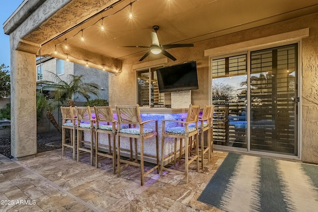 view of patio / terrace with ceiling fan