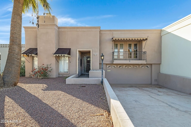 view of front of home with a garage