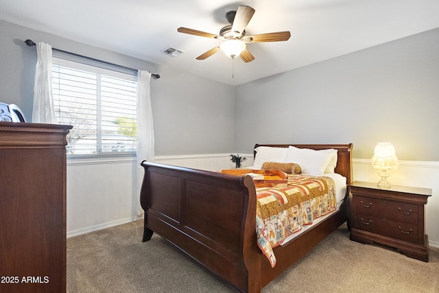 bedroom with ceiling fan and carpet flooring