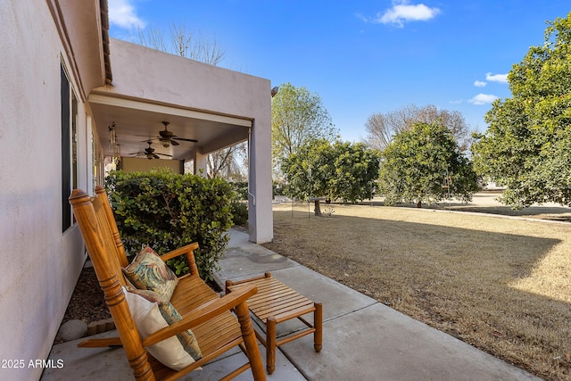 view of patio with ceiling fan