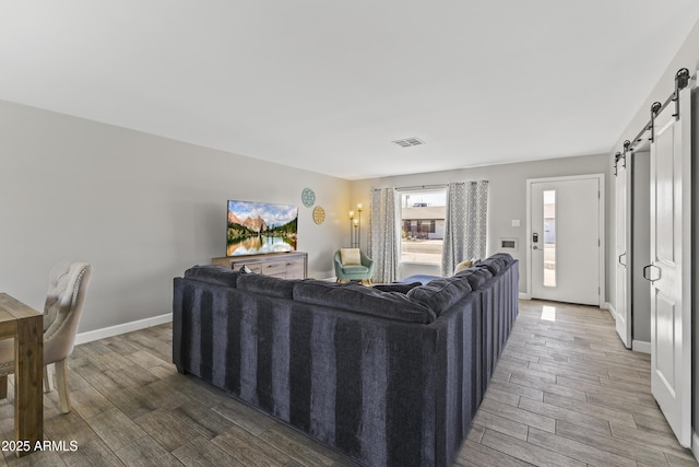 living room with a barn door