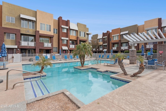 view of pool featuring a patio and a pergola