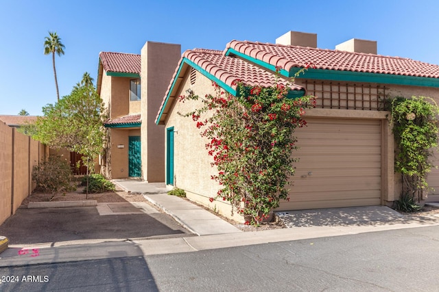 view of front of home with a garage