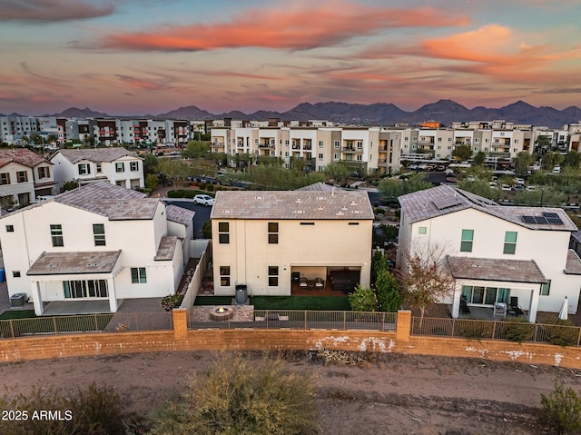 aerial view at dusk with a mountain view