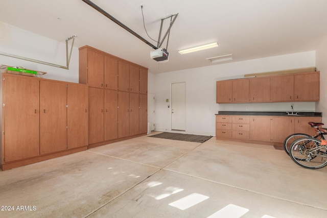 12832 W Pinnacle Vista Dr, Peoria, AZ 85383 - garage with a garage door opener and a sink