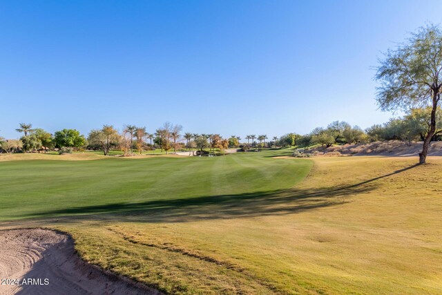 12832 W Pinnacle Vista Dr, Peoria, AZ 85383 - view of property's community featuring golf course view and a lawn