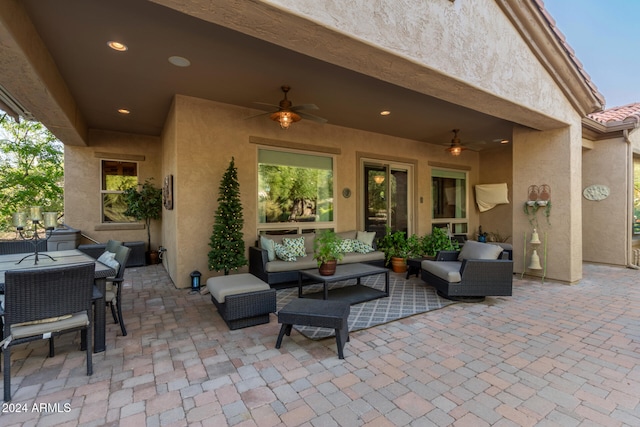 view of patio / terrace featuring an outdoor living space and ceiling fan