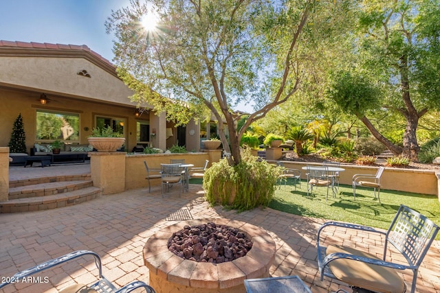 12832 W Pinnacle Vista Dr, Peoria, AZ 85383 - view of patio featuring a fire pit and outdoor dining space