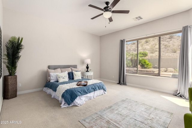 9747 S 182nd Dr, Goodyear, AZ 85338 - bedroom featuring visible vents, baseboards, ceiling fan, and carpet floors