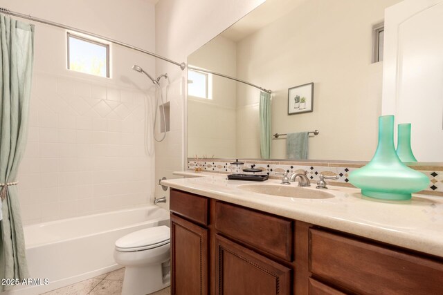 9747 S 182nd Dr, Goodyear, AZ 85338 - bathroom featuring toilet, shower / bath combo, vanity, and a wealth of natural light