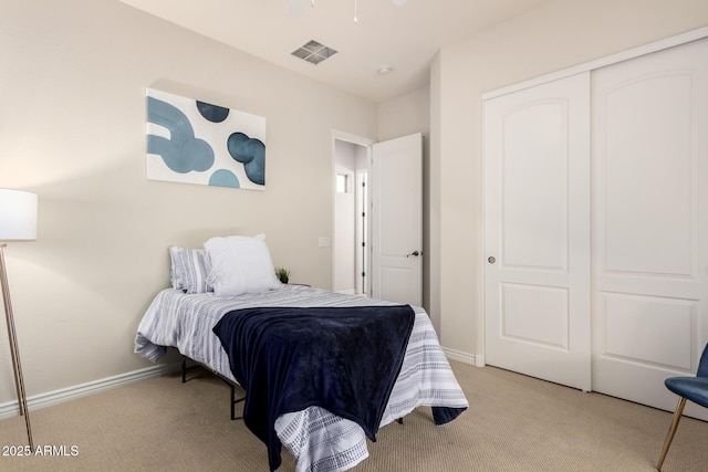 9747 S 182nd Dr, Goodyear, AZ 85338 - bedroom featuring a closet, carpet flooring, baseboards, and visible vents