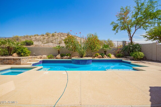 9747 S 182nd Dr, Goodyear, AZ 85338 - view of swimming pool featuring a patio area, a fenced backyard, and a fenced in pool