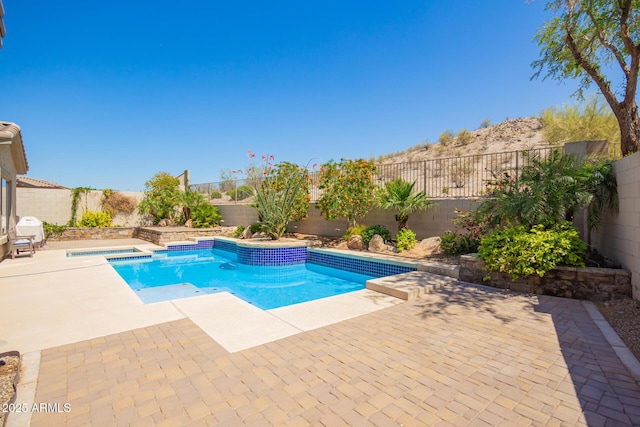 9747 S 182nd Dr, Goodyear, AZ 85338 - view of swimming pool with a patio, a fenced backyard, and a fenced in pool