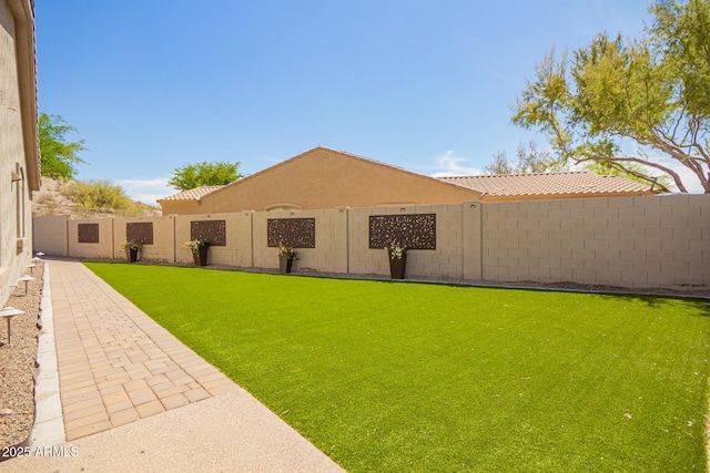 9747 S 182nd Dr, Goodyear, AZ 85338 - view of yard with a fenced backyard