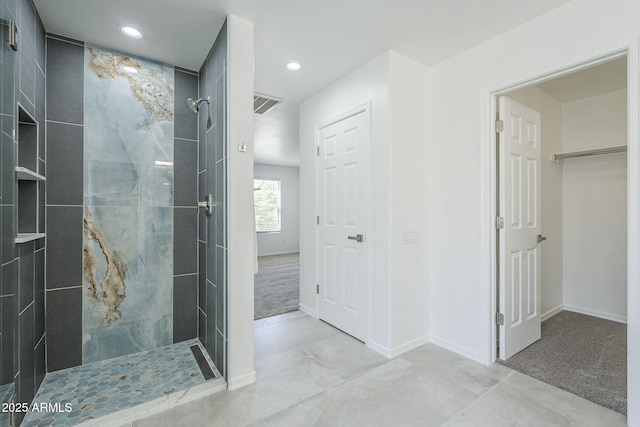 full bath featuring baseboards, walk in shower, and recessed lighting
