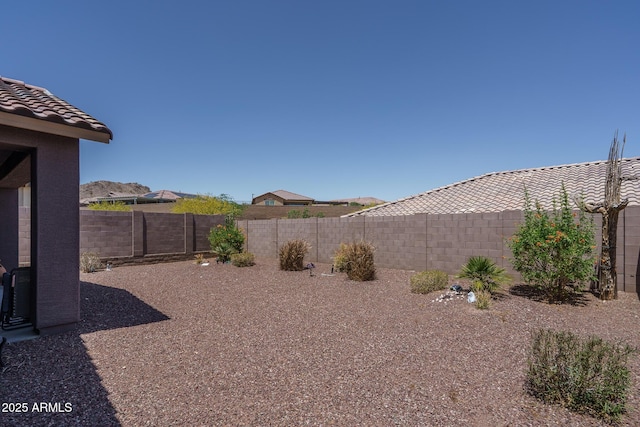 view of yard featuring a fenced backyard
