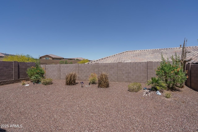 view of yard featuring a fenced backyard