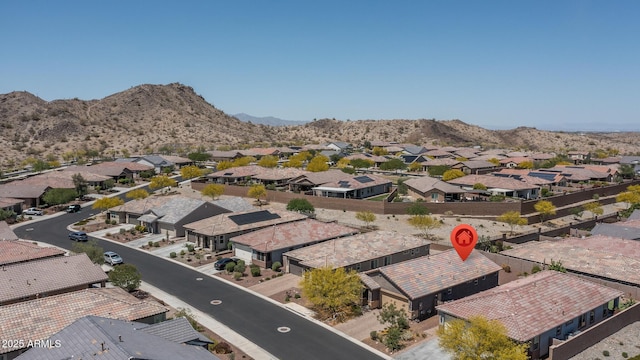drone / aerial view with a residential view and a mountain view