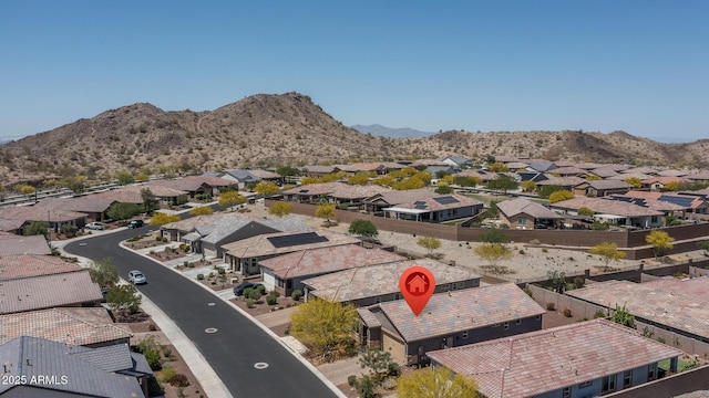 birds eye view of property featuring a residential view and a mountain view