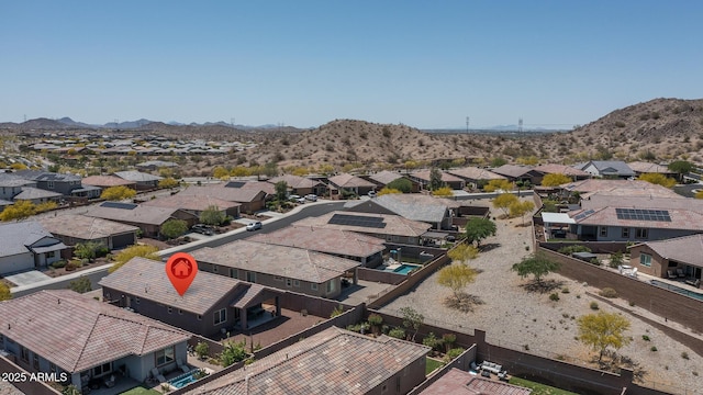 bird's eye view with a residential view and a mountain view