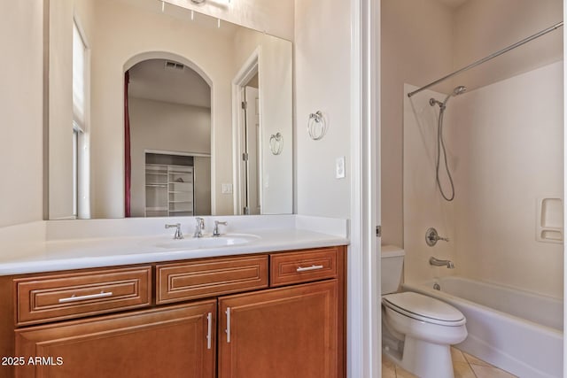 full bathroom with vanity, tile patterned floors, bathing tub / shower combination, and toilet