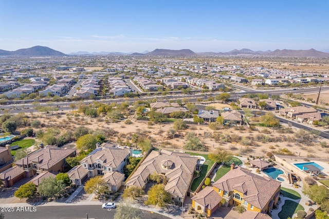 bird's eye view with a mountain view