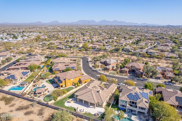 drone / aerial view featuring a mountain view