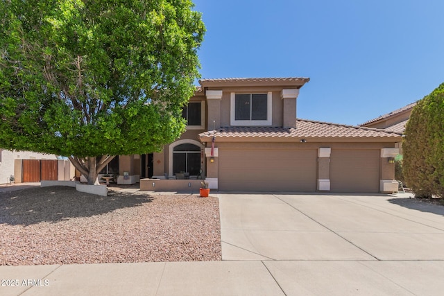 991 N Quail Ln, Gilbert, AZ 85233 - mediterranean / spanish-style house featuring a tiled roof, stucco siding, driveway, and fence