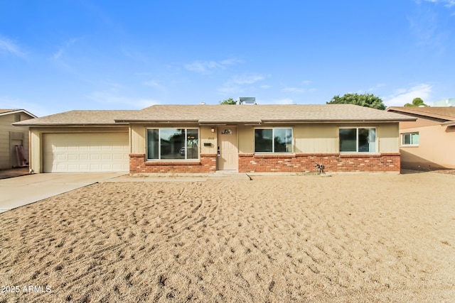 2922 S Cottonwood Dr, Tempe, AZ 85282 - single story home featuring brick siding, an attached garage, concrete driveway, and roof with shingles