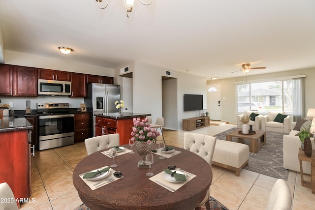 2922 S Cottonwood Dr, Tempe, AZ 85282 - dining area featuring light tile patterned floors and a ceiling fan
