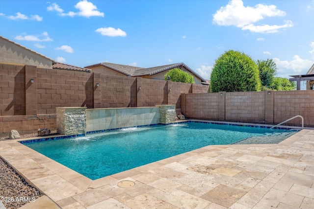 view of swimming pool featuring pool water feature and a patio area