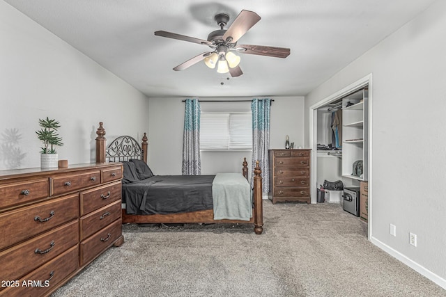 591 N Cheri Lynn Dr, Chandler, AZ 85225 - bedroom with light colored carpet, a closet, a ceiling fan, and baseboards