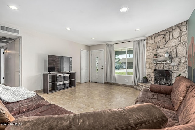 591 N Cheri Lynn Dr, Chandler, AZ 85225 - tiled living area with recessed lighting, baseboards, and a stone fireplace