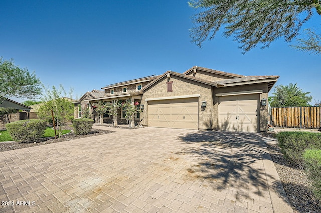 view of front of home with a garage