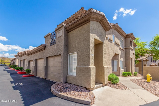 view of property with a garage