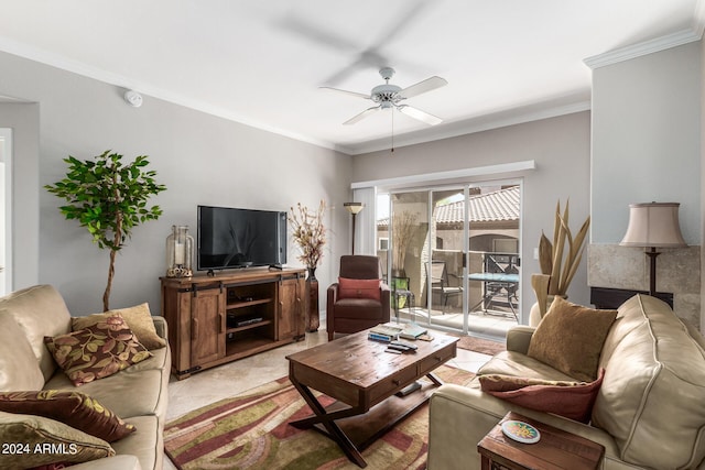 living room with crown molding and ceiling fan