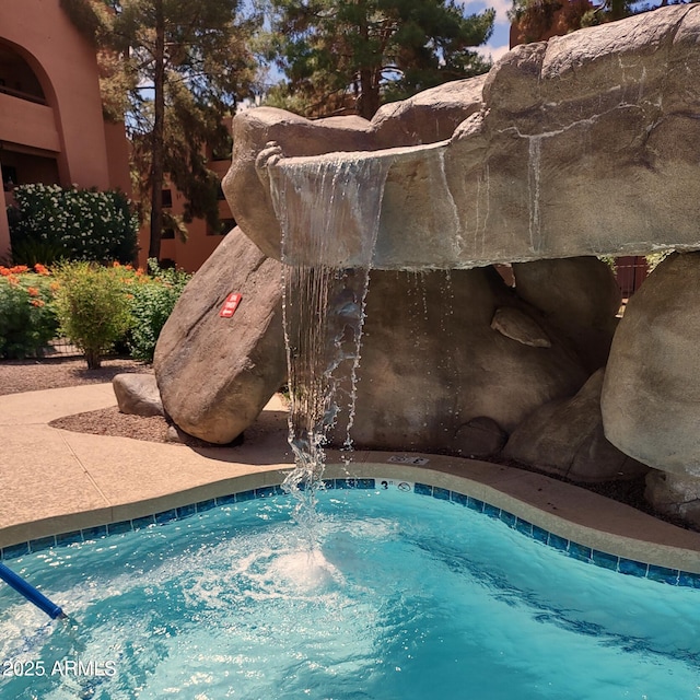 12222 N Paradise Village Pkwy S Unit 442, Phoenix, AZ 85032 - view of swimming pool with a pool