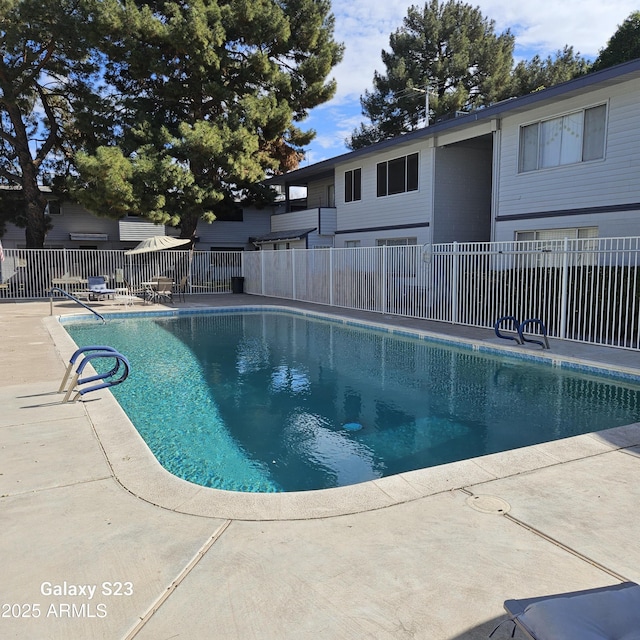 view of pool with a patio