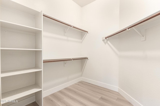 22322 N 77th St, Scottsdale, AZ 85255 - walk in closet with wood finished floors