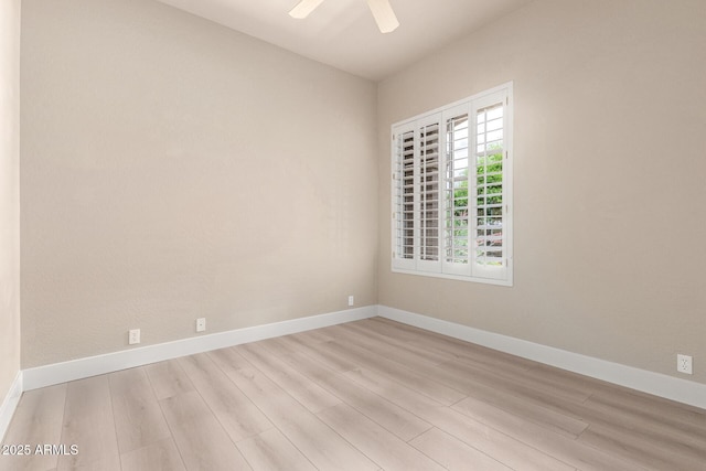 22322 N 77th St, Scottsdale, AZ 85255 - spare room featuring wood finished floors, baseboards, and a ceiling fan