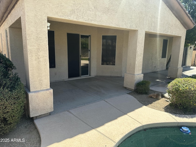 22322 N 77th St, Scottsdale, AZ 85255 - rear view of property featuring stucco siding and a patio area